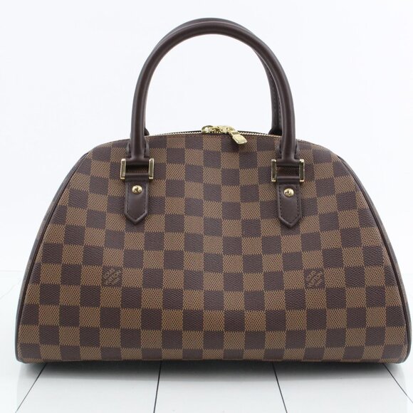 Louis Vuitton Handbags - Louis Vuitton Rivera MM with Dustbag